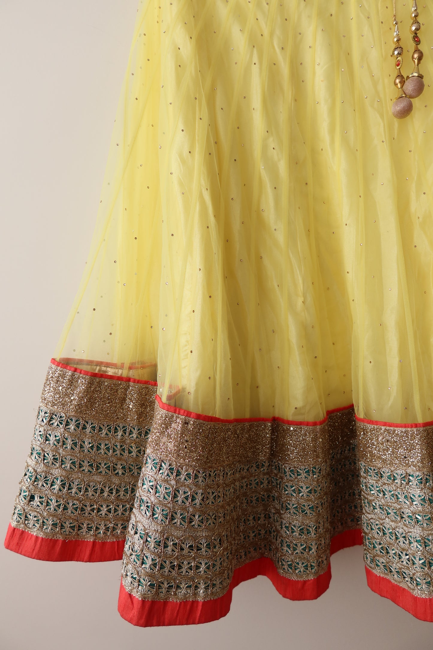 Yellow & Bottle Green Net Lehenga with Bright Orange Dupatta